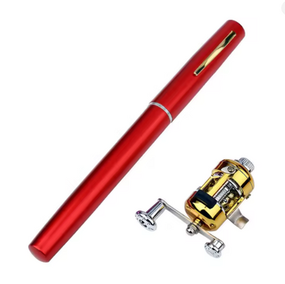 A red metal pen shown diagonally next to a small gold and silver fishing reel on a plain white background.
