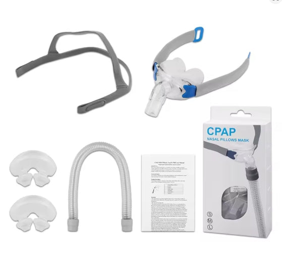 CPAP nasal pillows mask with components and packaging on a white background