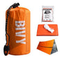 Orange BVX bag with emergency supplies including a tube tent and rope on a white background