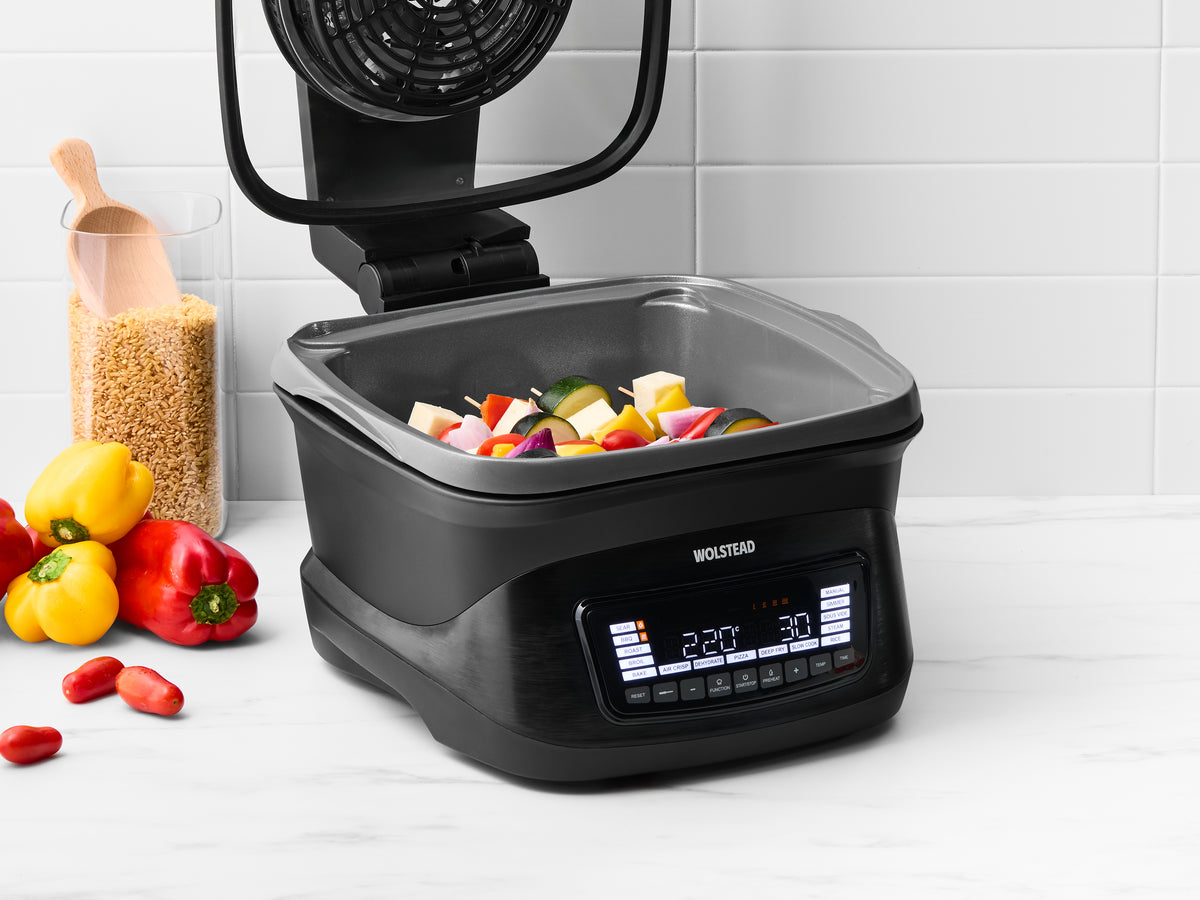 Wolstead Cookmaster 14-in-1 Multi Cooker Air Fryer 8L on kitchen bench