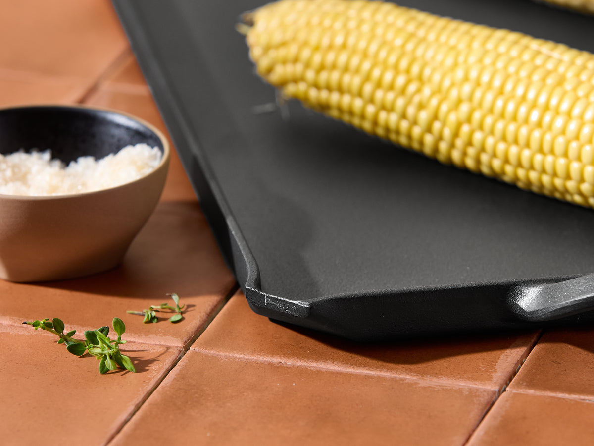 Wolstead Ember Cast Iron Griddle 46x26cm cooking on stovetop