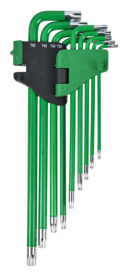 A set of green hex wrenches with silver bit ends and a black holder, shown on a plain white background.