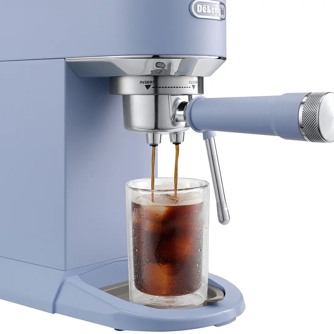 DeLonghi Dedica Duo EC890LA close-up of cold brew espresso extraction into iced glass