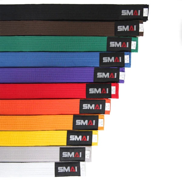 Set of SMAI belts in various colors on a white background