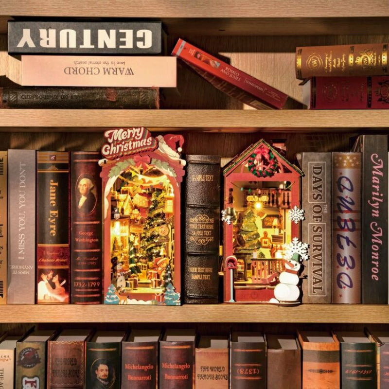 Decorative Christmas bookends on a bookshelf with books around them.