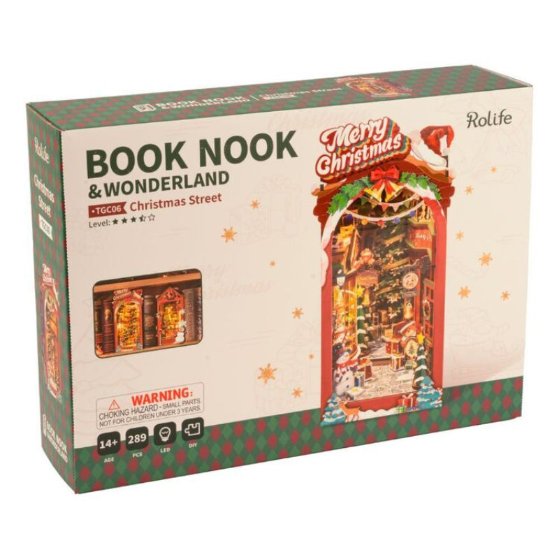 Rolife Book Nook & Wonderland T1606 Christmas Street toy set in its original retail packaging, featuring a festive red and green holiday-themed box with product details and age recommendations.