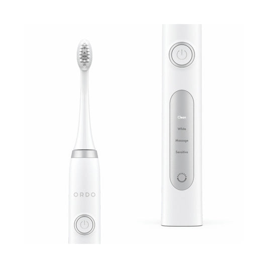 Ordo Sonic Plus electric toothbrush in white and silver on white background