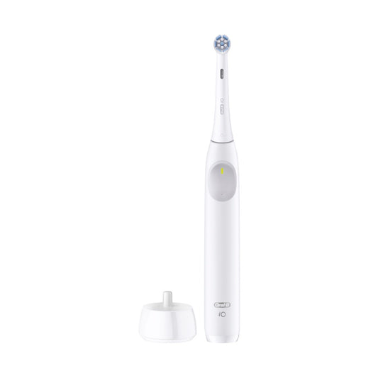 Oral-B iO Series 2 white electric toothbrush with charging base on white background