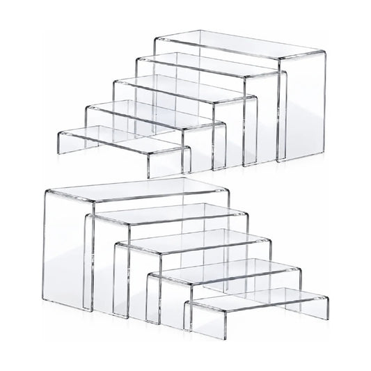 Acrylic risers displaying perfume and makeup