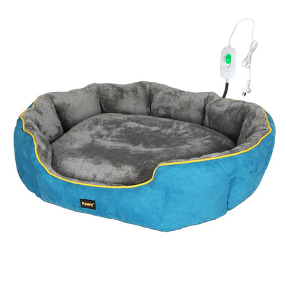 Blue and gray pet bed with heating element on a white background
