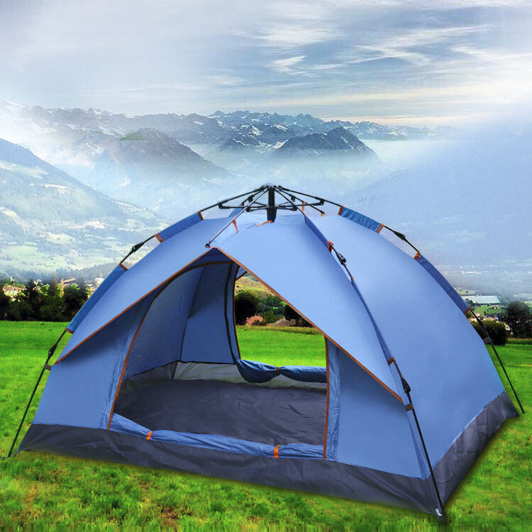 Blue pop up tent at a mountain campsite