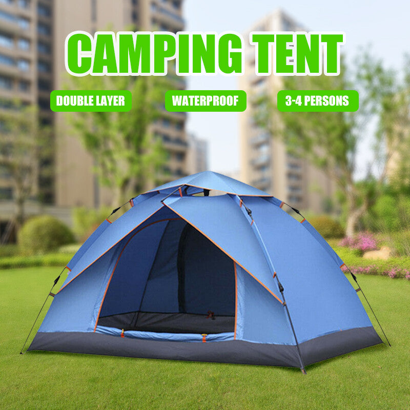 Blue pop up dome tent pitched on grass