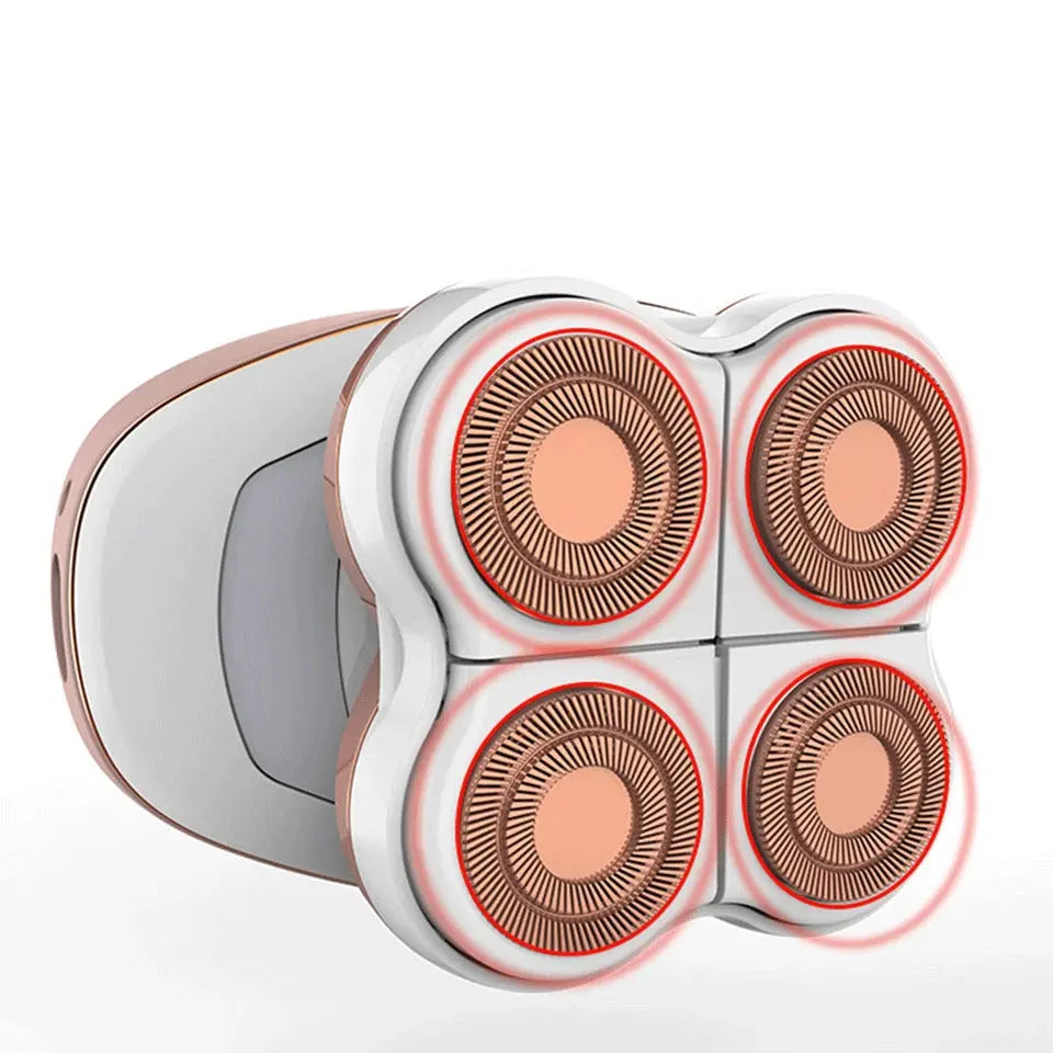 Close-up of a four-blade electric shaver on a white background