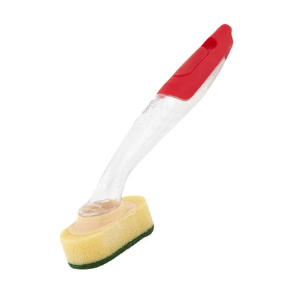 Cleaning brush with yellow sponge head and red handle on a white background