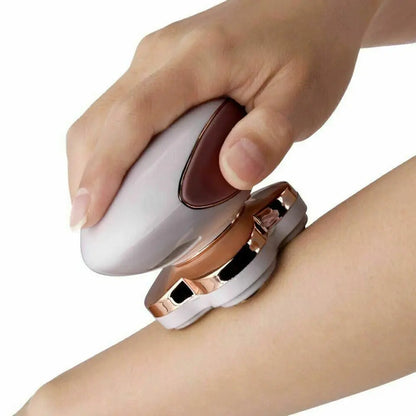 Hand using a white and rose gold electronic device on a wrist against a white background